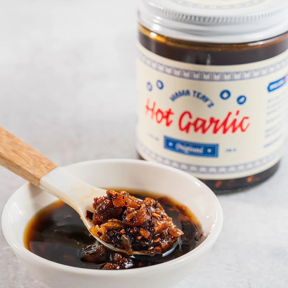 SPICY! CRUNCHY! UMAMI! The best Hot Garlic from Mama Teav's family recipe of fiery heat, crispy garlic, and rich umami. Add it to your favorite dish for a touch of spicy, sweet, and savory flavor.