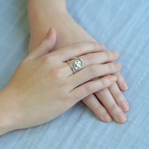 Garden of Desire - Innate Carving Ring Handmade in sterling silver, the ring wraps around the finger like a delicate, twirling vine. At its tip blooms an organic curvilinear shape that rests on the finger, gently curled. Sterling silver rings for modern women, everyday wear to impress. 
