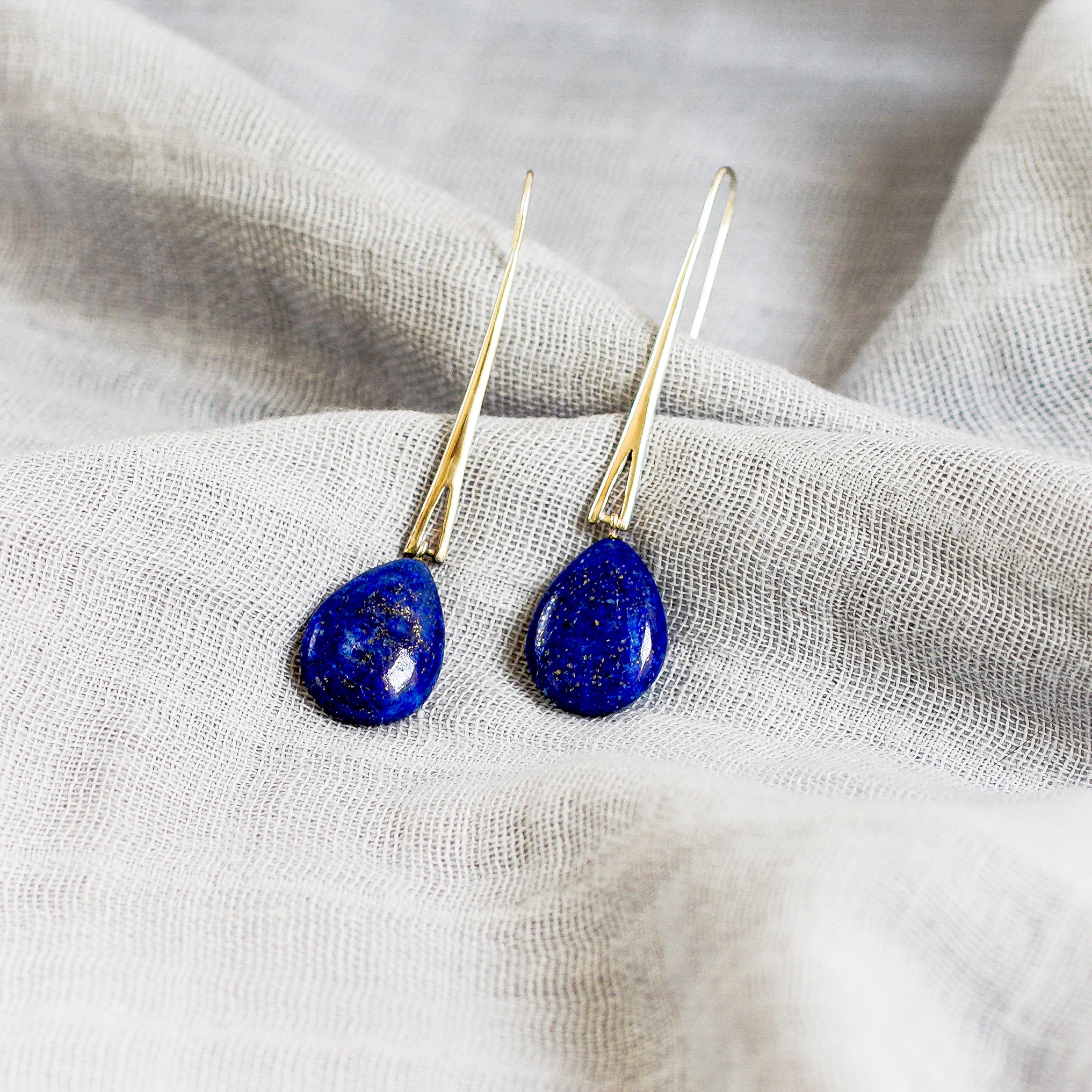 Garden of Desire - Lapis Long Earrings These earrings are ike fresh drops of dew that adorn natural foliage at the dawn of a new day.