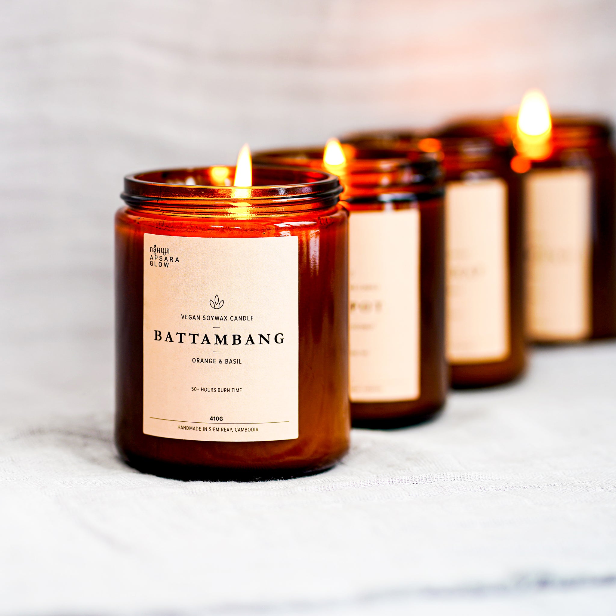 Fill your room with this delicious candle. This natural, vegan soy wax candle features citrus top notes of juicy orange and mandarin with local basil essential oil to add a spicy edge. It is inspired by the city of Battambang, famously known as the ‘rice bowl ‘ of Cambodia.