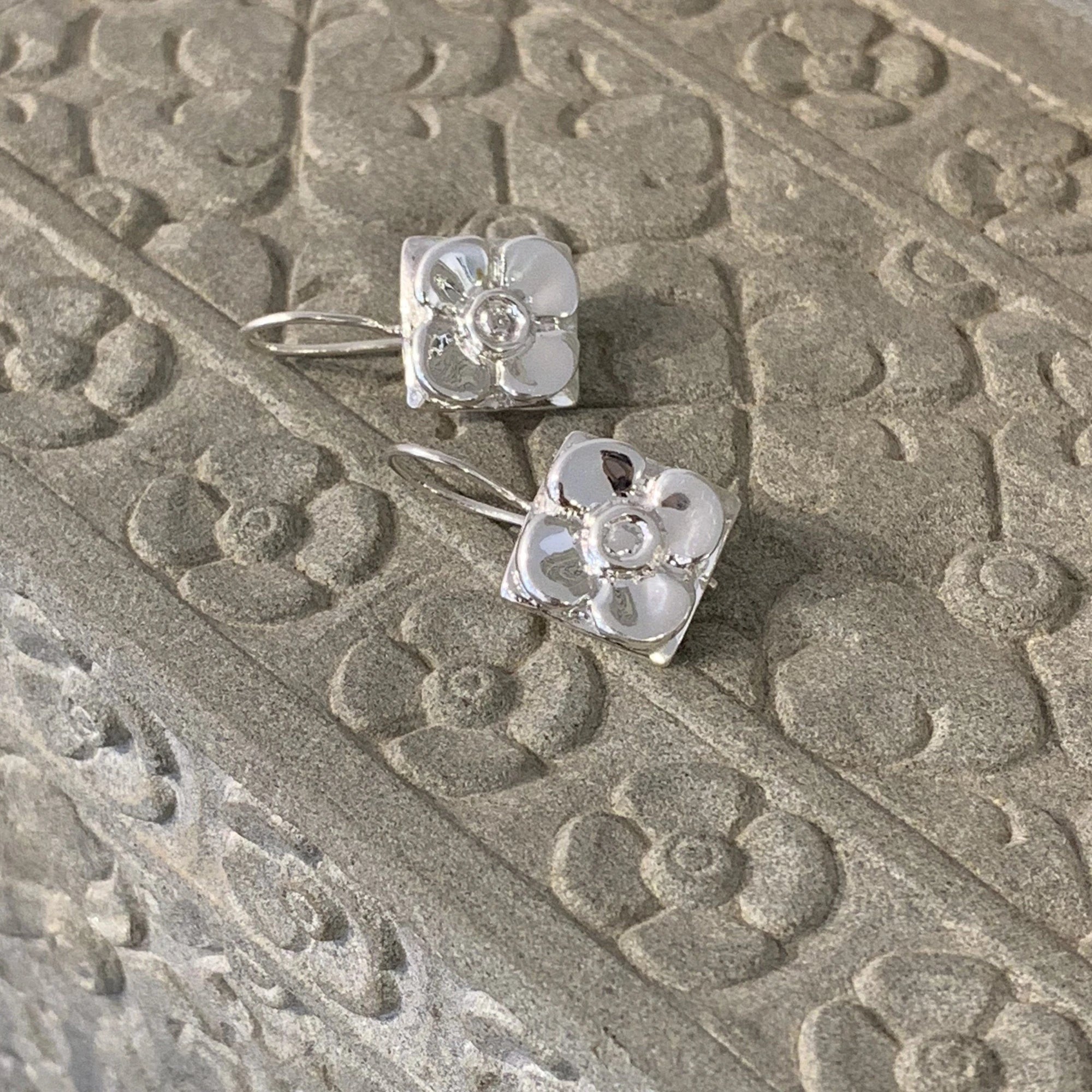Garden of Desire - Kbach Chan Flower Earrings These exquisitely handcrafted earrings in sterling silver, sit comfortably just below the earlobe, adding to your look a delicate allure.