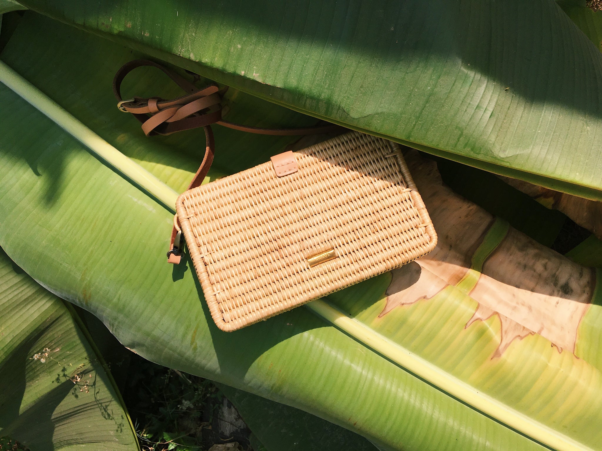 This handwoven rattan crossbody bag transitions perfectly from daytime into the night and will be your go-to for every occasion. 